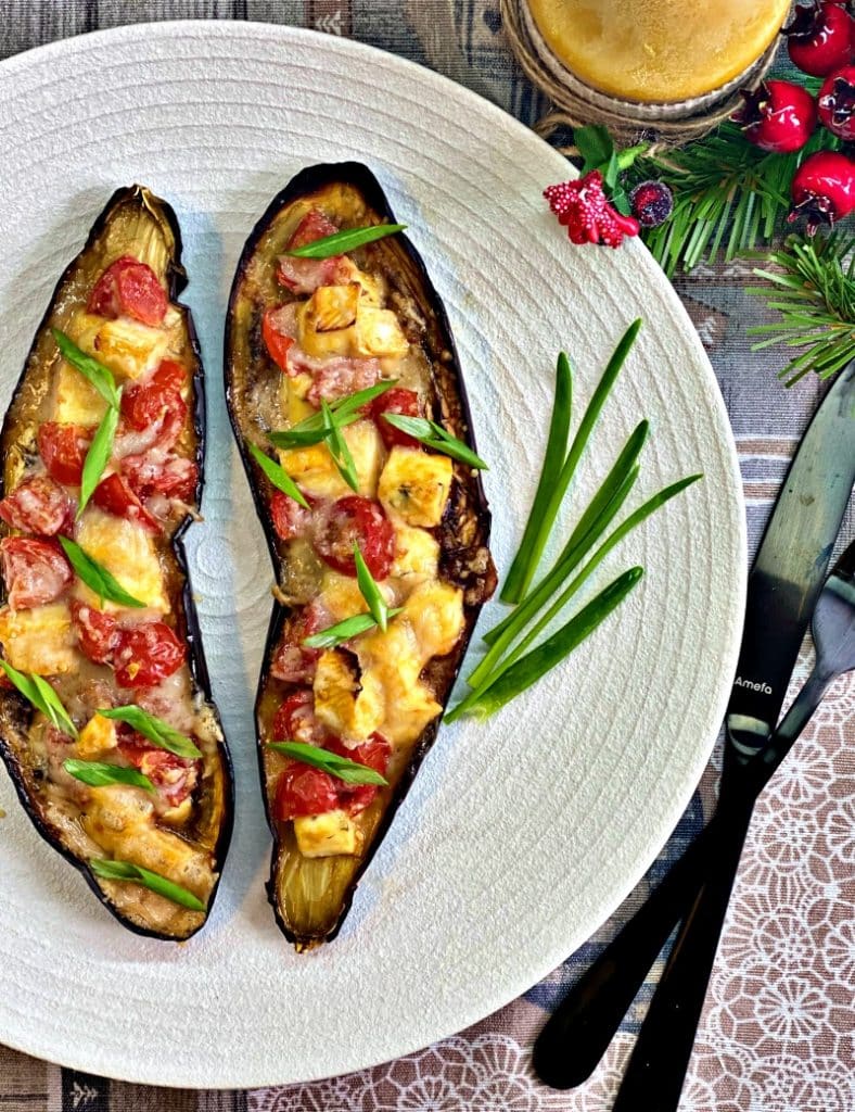 Baked eggplant with brie cheese and parmesan and tomatoes