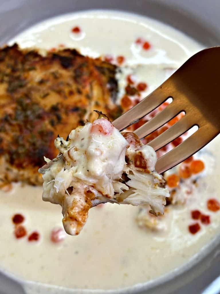 White fish and creamy sauce with red caviar