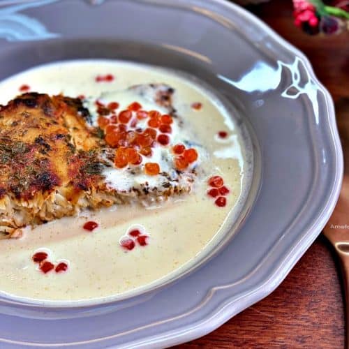 White fish and creamy sauce and red caviar