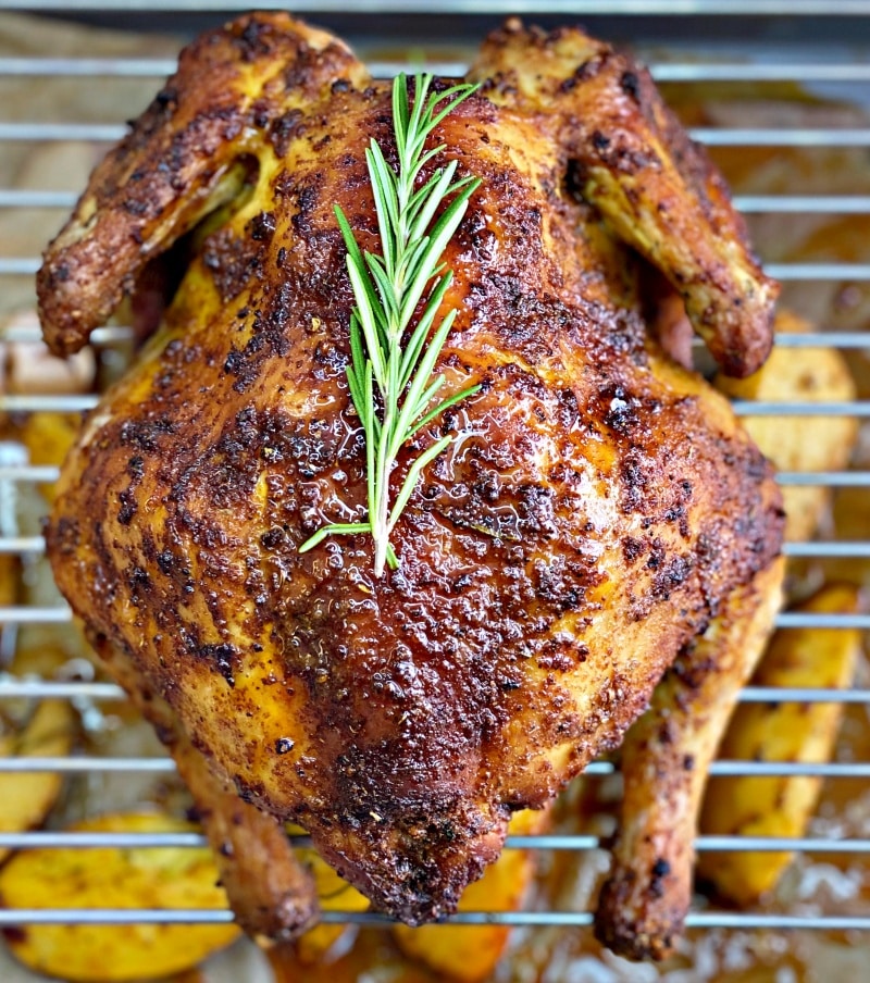roasted chicken in the oven with herbs