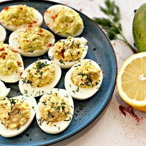 Stuffed deviled eggs with avocado and cod liver