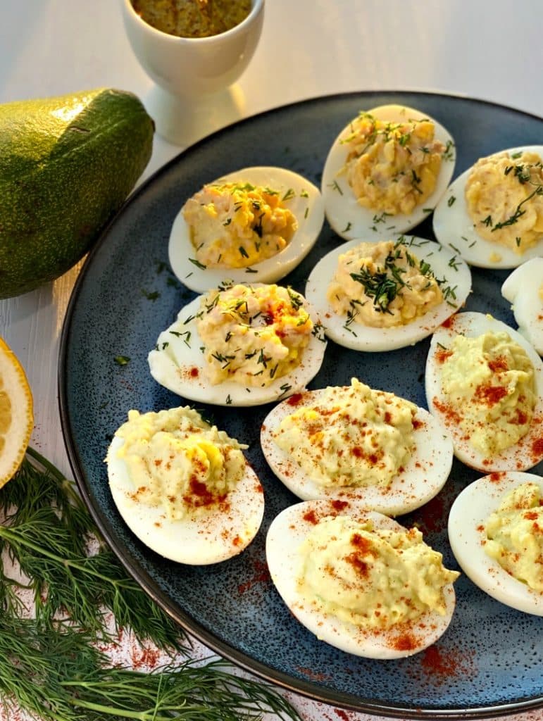 Stuffed deviled eggs with avocado and cod liver