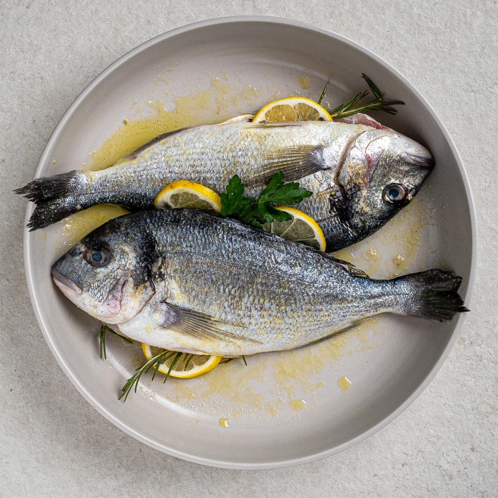 marinated fish in olive oil, rosemary and lemon
